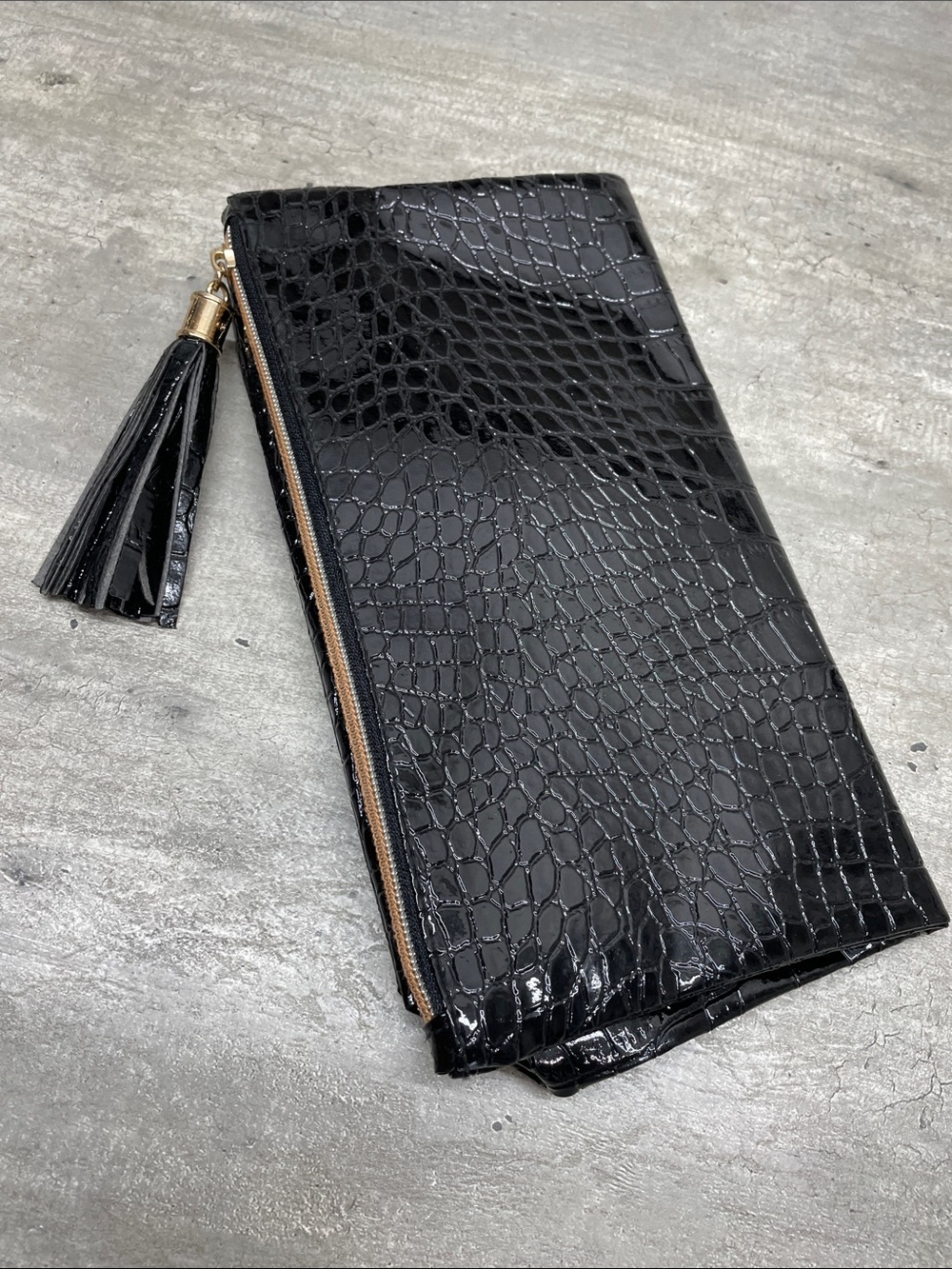 Glossy Black Croc-Embossed Tassel Zip Clutch